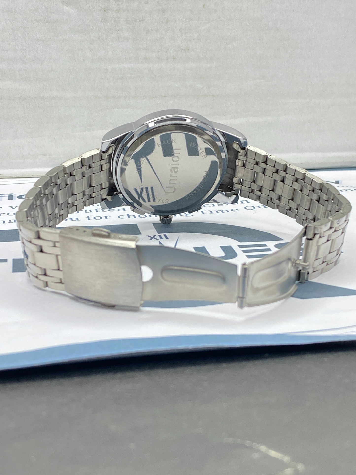 UNRAION Men’s Skeleton Dial Stainless Steel Chain Analog Watch with Date Display